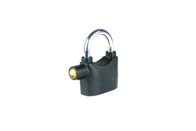 Close-up of padlocks against white background