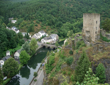 High angle view of bridge amidst plants and trees