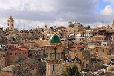 Aerial view of townscape against sky