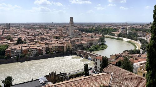 View over verona from castel san pietro  high angle of river amidst buildings in town against sky