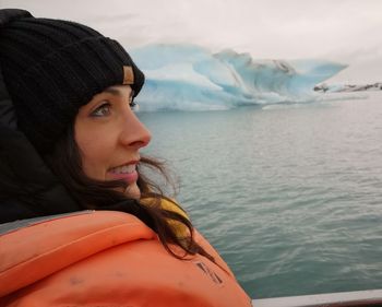 Portrait of young woman in boat