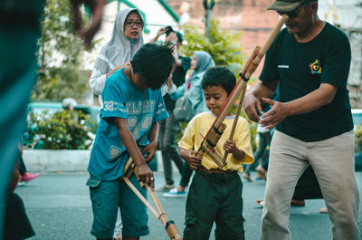 Group of people playing outdoors