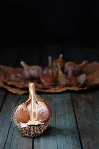 Close-up of food on table against black background