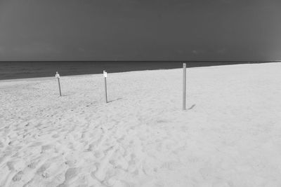 Scenic view of sea against sky during winter