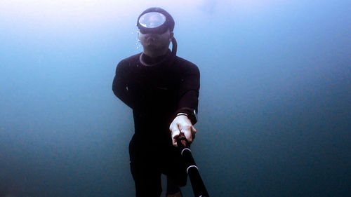 Man swimming in sea