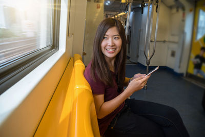 Young woman using mobile phone