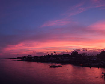 Scenic view of sea against sky at sunset