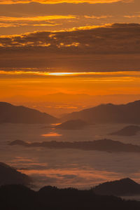 Scenic view of dramatic sky during sunset