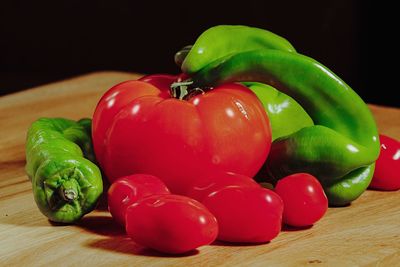Close-up of red chili peppers on table