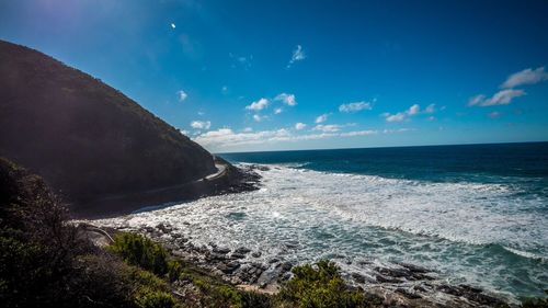 Scenic view of sea against blue sky