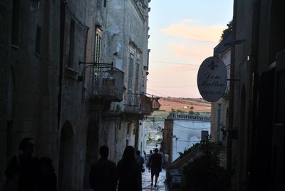 Panoramic view of silhouette city against sky during sunset