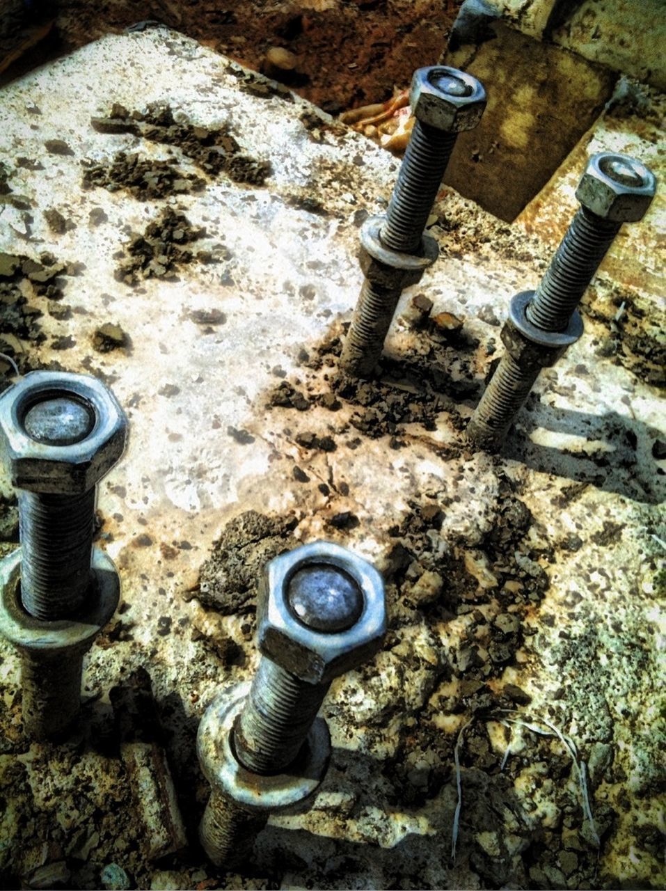 metal, high angle view, close-up, metallic, rusty, old, equipment, obsolete, abandoned, still life, no people, day, industry, outdoors, technology, pipe - tube, run-down, bolt, rock - object, stone - object