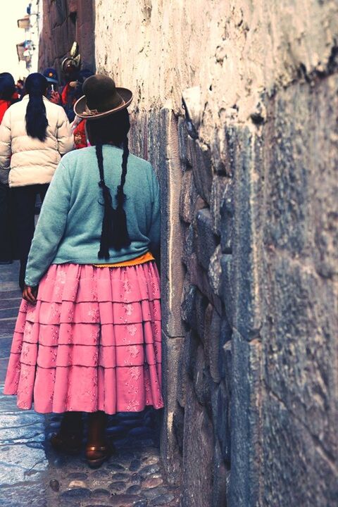 red, built structure, architecture, building exterior, wall - building feature, hanging, wall, brick wall, day, old, weathered, outdoors, street, lantern, house, abandoned, standing, focus on foreground