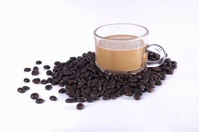 Close-up of coffee cup against white background
