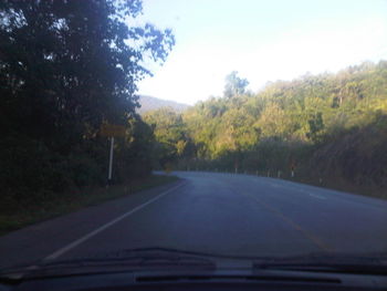 Road passing through trees