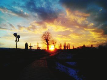 Panoramic view of road against sky during sunset