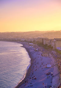 High angle view of beach against sky during sunset