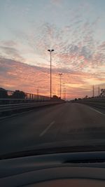 Road against sky during sunset