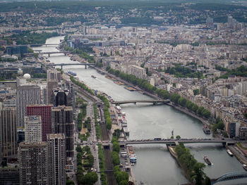 High angle view of river amidst buildings in city