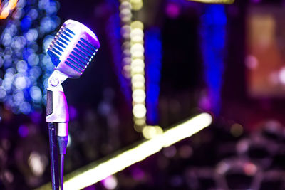 Close-up of illuminated lighting equipment