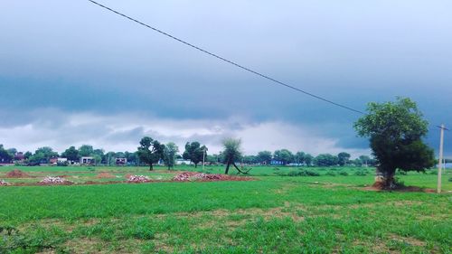 Scenic view of field against sky