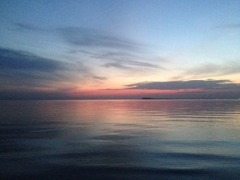 Scenic view of sea against sky at sunset