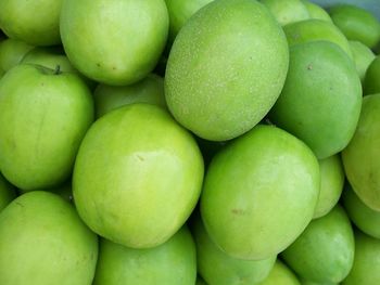 Full frame shot of green apples for sale at market