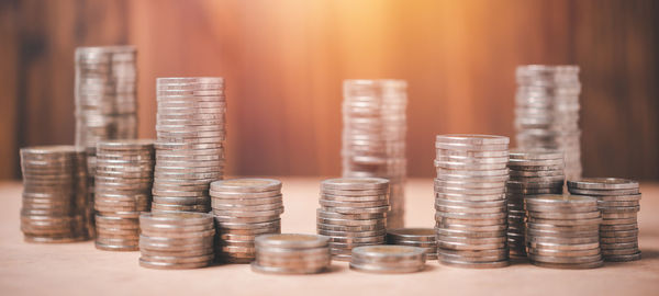 Close-up of coins on table