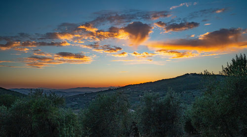 Scenic view of dramatic sky during sunset