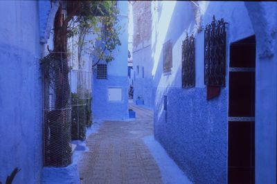 Alley amidst buildings in city