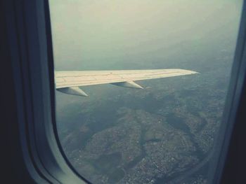 Cropped image of airplane window