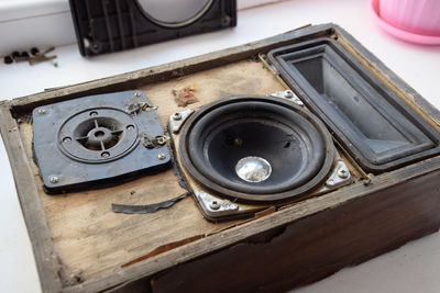 High angle view of old camera on table