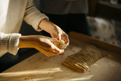 Preparing cinnamon buns