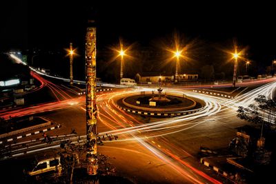 Light trails on city street at night