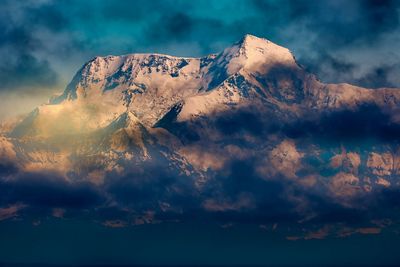 Scenic view of mountains against sky during sunset