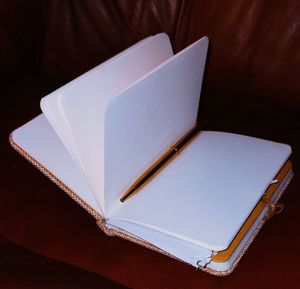 High angle view of book on table