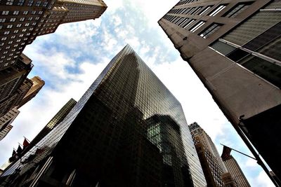 Low angle view of modern buildings against sky