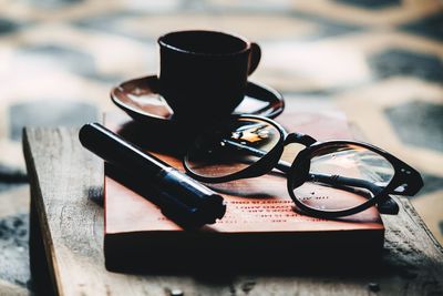 High angle view of coffee cup on table