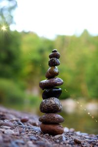 Close-up of stone stack on rock