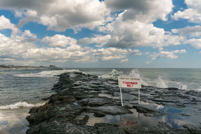 Scenic view of beach against sky