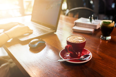 High angle view of coffee cup on table