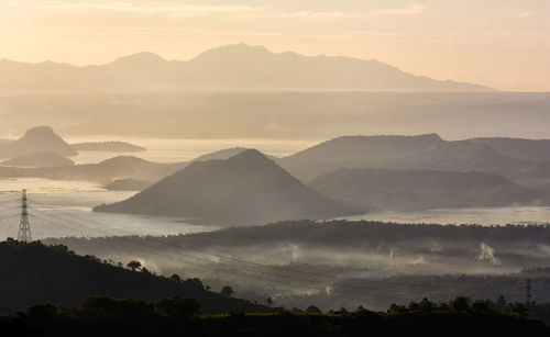 Scenic view of mountains against sky during sunset