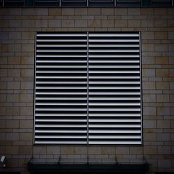 Close-up of window on brick wall