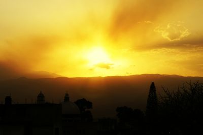 Scenic view of mountains at sunset