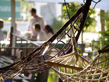 People on metal railing in playground