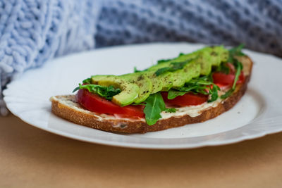 Close-up of sandwich served in plate