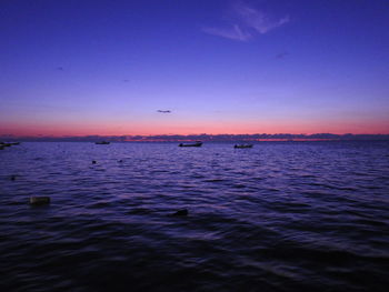 Scenic view of sea at sunset