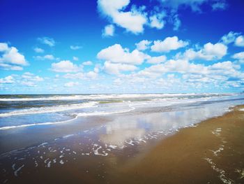 Scenic view of beach against sky