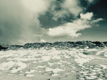 Scenic view of frozen sea against sky