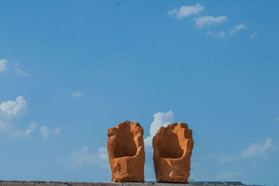 Close-up of bread against blue sky